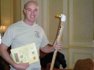 Maj. Joe Clayburn’s cane was turned by Harriet Maloney of the Capitol Area Wood Turners and carved by John Overman of the Northern Virginia Carvers Association.