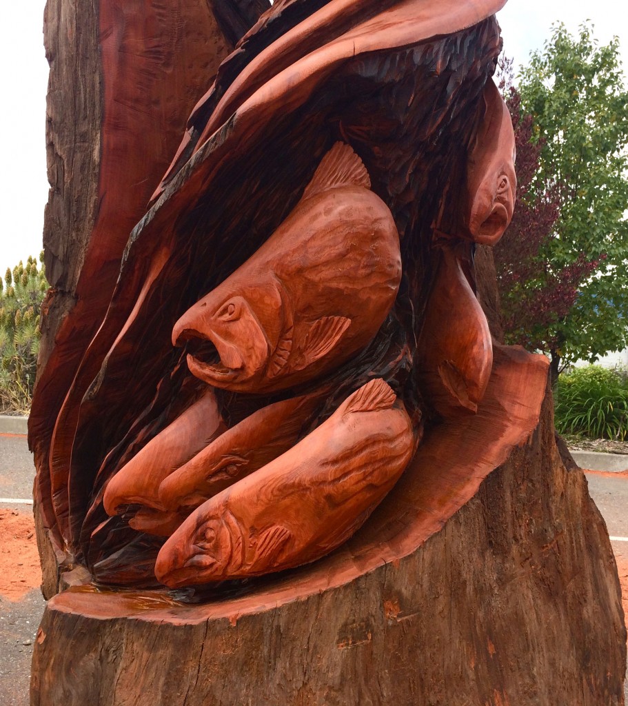 Jessie carved Grizzly Bear and Salmon Spirit, 3' by 7', into reclaimed old growth redwood.